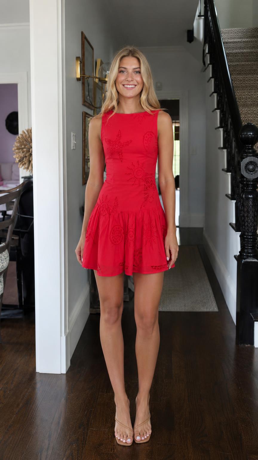 Front view of model wearing red sleeveless embroidered mini dress