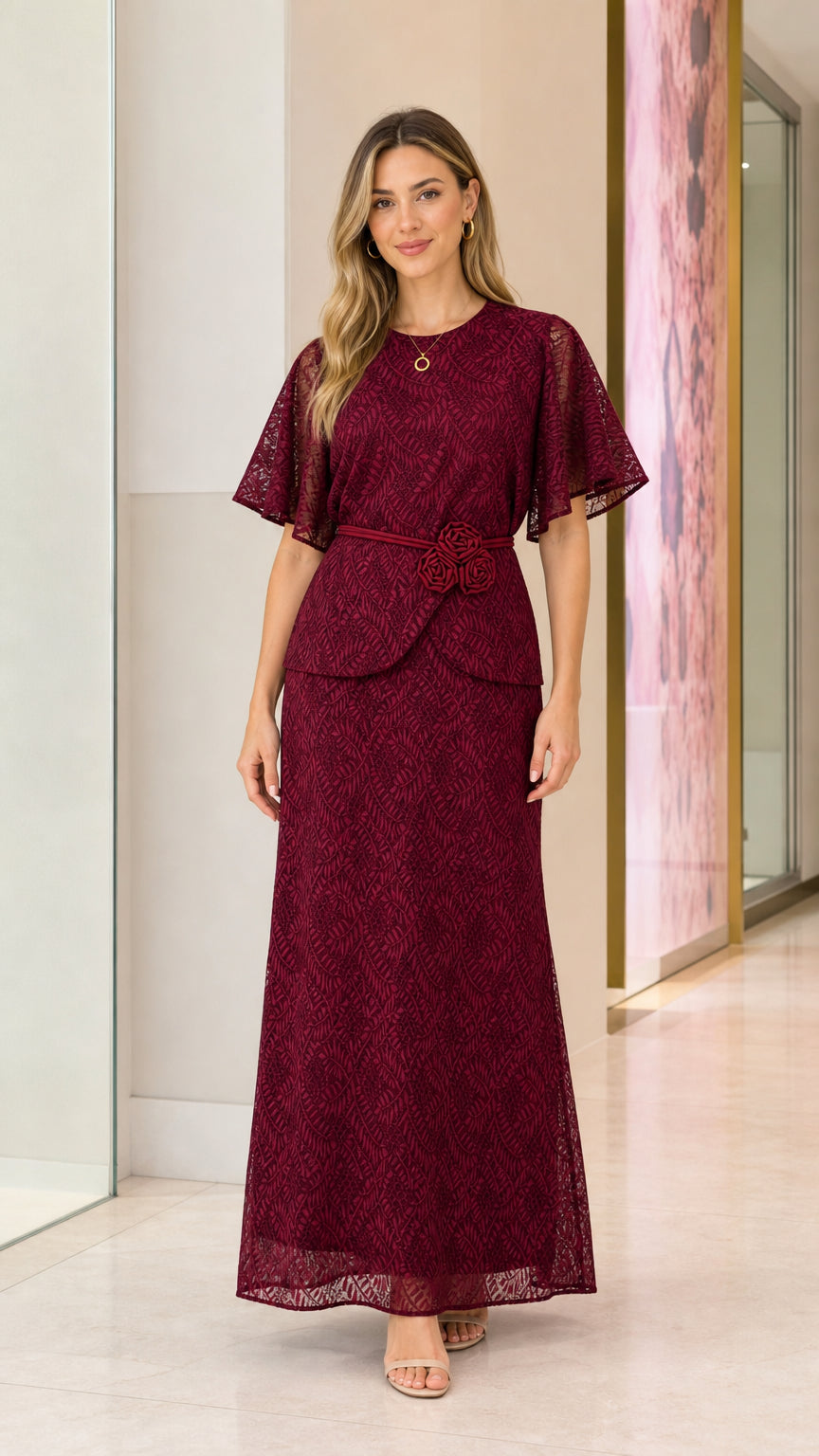 Model wearing burgundy lace maxi dress from the front
