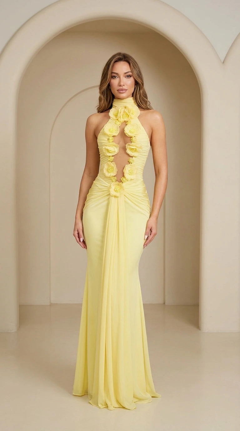 Front view of yellow halter neck evening gown with rosette details