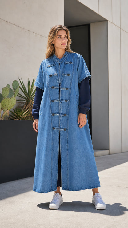 Full front view of medium blue denim maxi duster vest coat