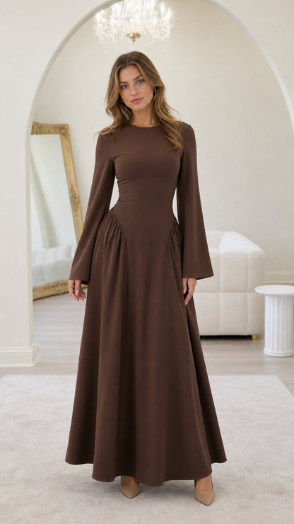 Front view of model wearing brown long-sleeve maxi dress