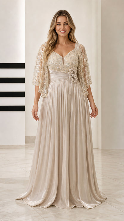 Front view of woman wearing Champagne sequin bodice flutter sleeve pleated evening gown