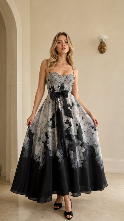 Front view of model wearing black floral ombre maxi dress