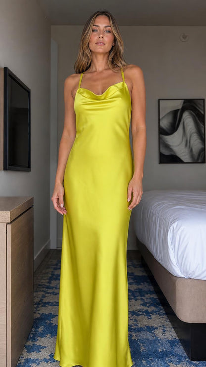 Front view of model wearing chartreuse satin cowl neck maxi dress