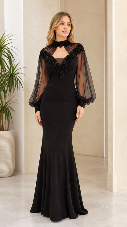 Front view of black beaded mesh evening gown