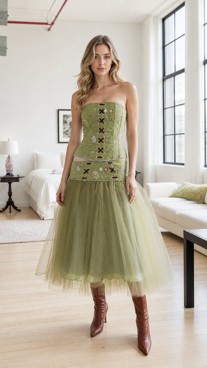 Front view of model wearing sage green embroidered corset and tulle midi skirt set