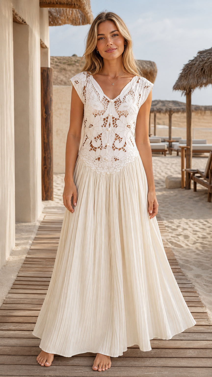 Model wearing white boho crochet lace maxi dress, front view