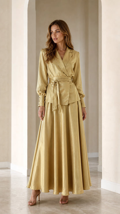 Front full view of woman wearing Champagne Gold satin wrap blazer and maxi skirt two-piece set