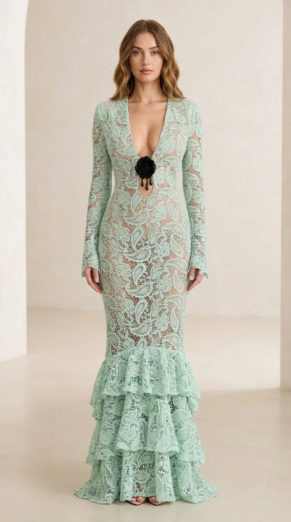 Front view of model wearing mint green floral lace long-sleeve maxi dress