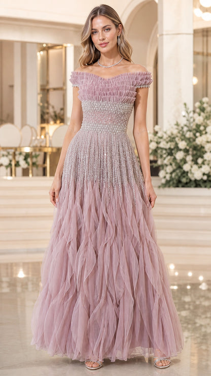 Front view of model wearing dusty rose off-shoulder ruffled tulle evening gown