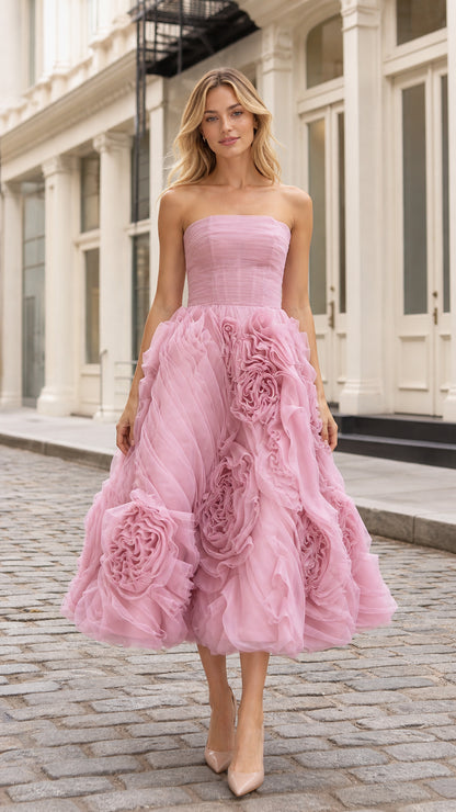 Front view of pink strapless ruched mesh midi dress with 3d floral appliques