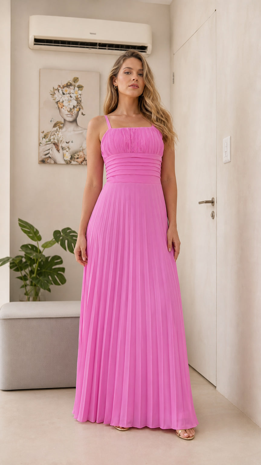 Front view of model wearing the fuchsia pleated maxi dress