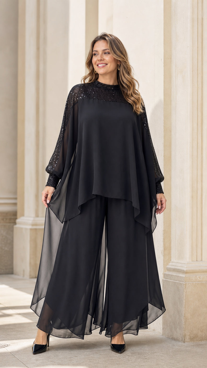 Model wearing black sequin chiffon top and wide leg pants set, front view