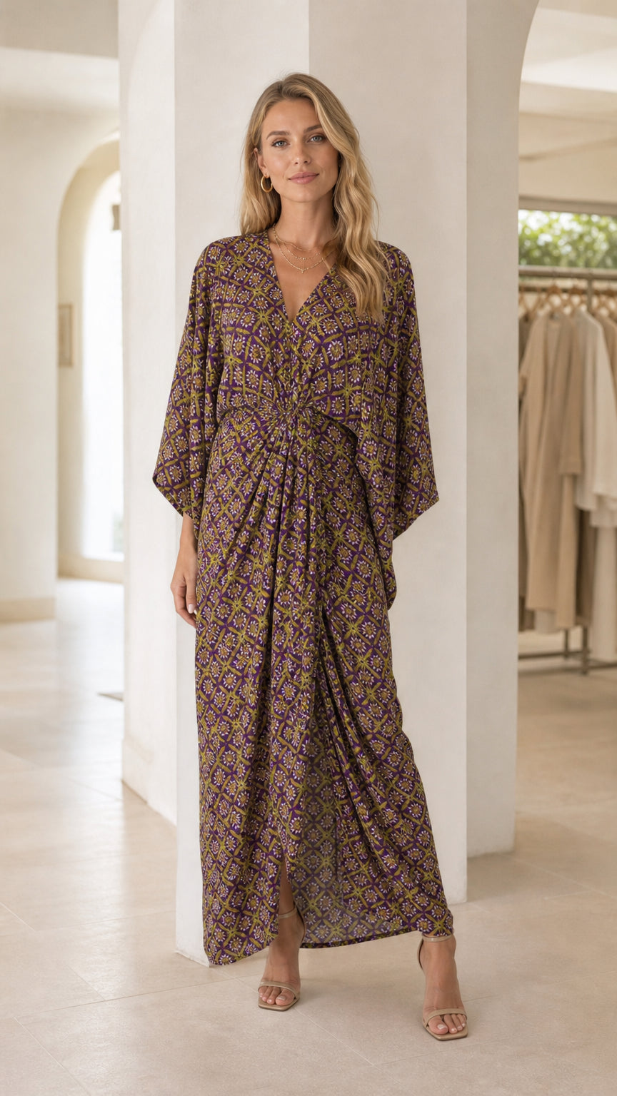 Model wearing purple printed V-neck maxi dress from the front