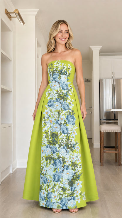 Front view of model wearing lime green floral strapless maxi dress