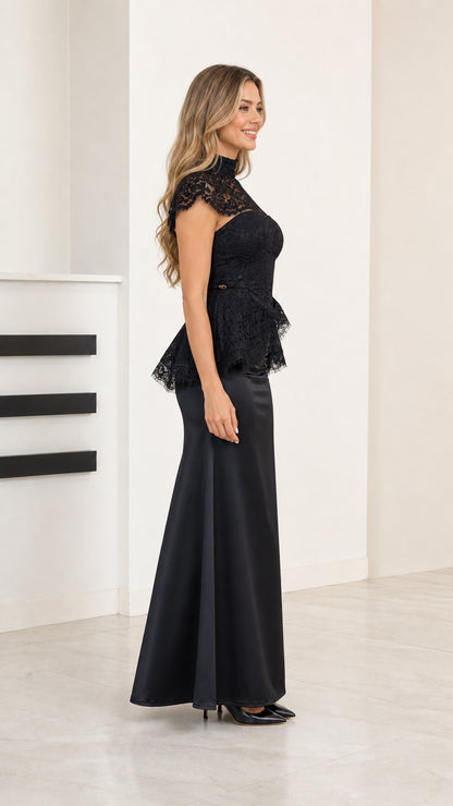 Side profile of woman wearing black lace peplum formal dress
