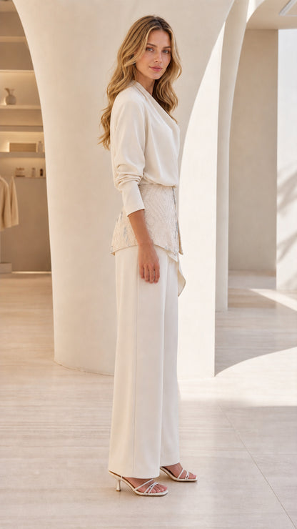 Side profile view of cream two-piece set
