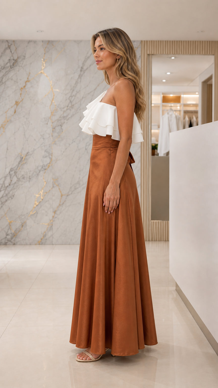 Side profile of caramel brown satin evening gown