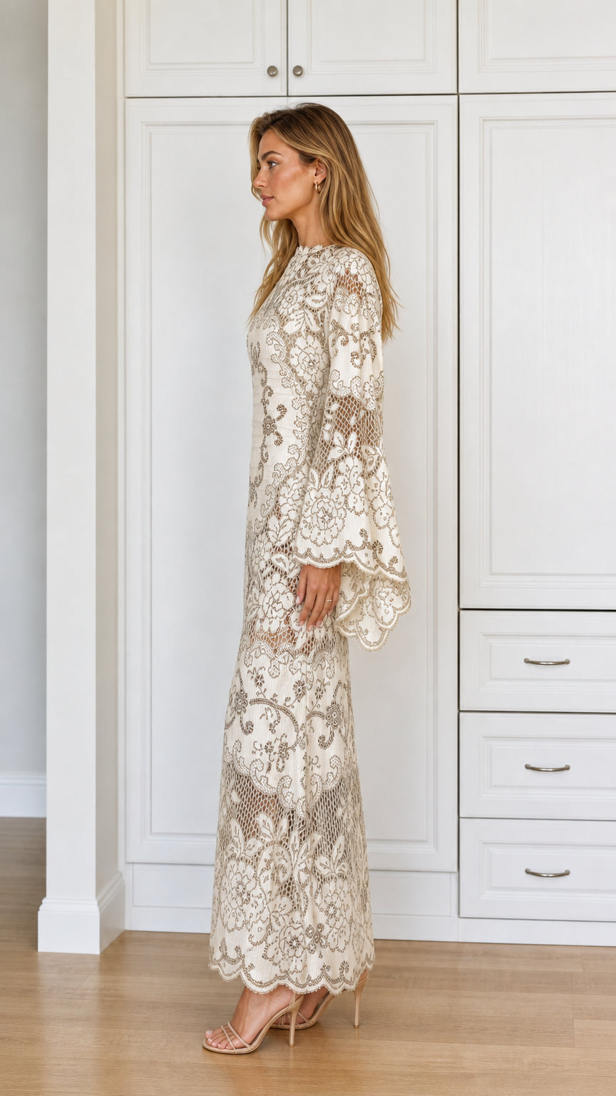Side view of Cream long sleeve lace maxi dress