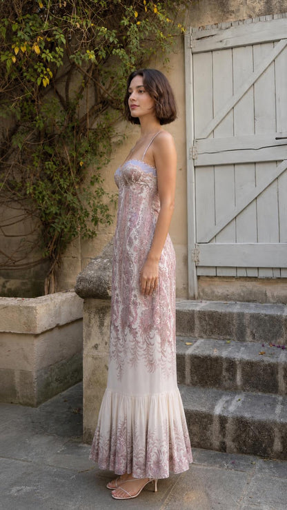 Side profile view of pink paisley maxi dress