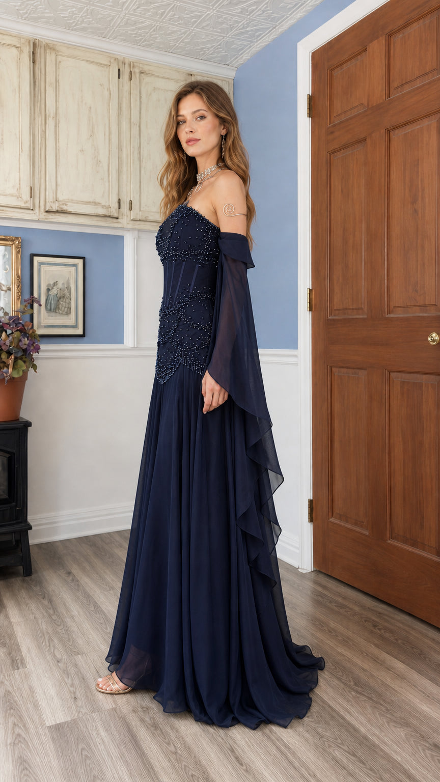 Navy blue beaded corset evening gown, side angle showing draped cape sleeves