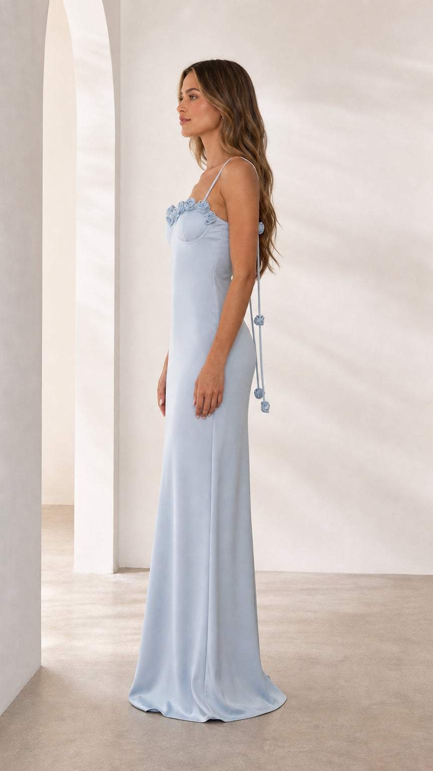 Side profile of light blue satin maxi dress with back ties