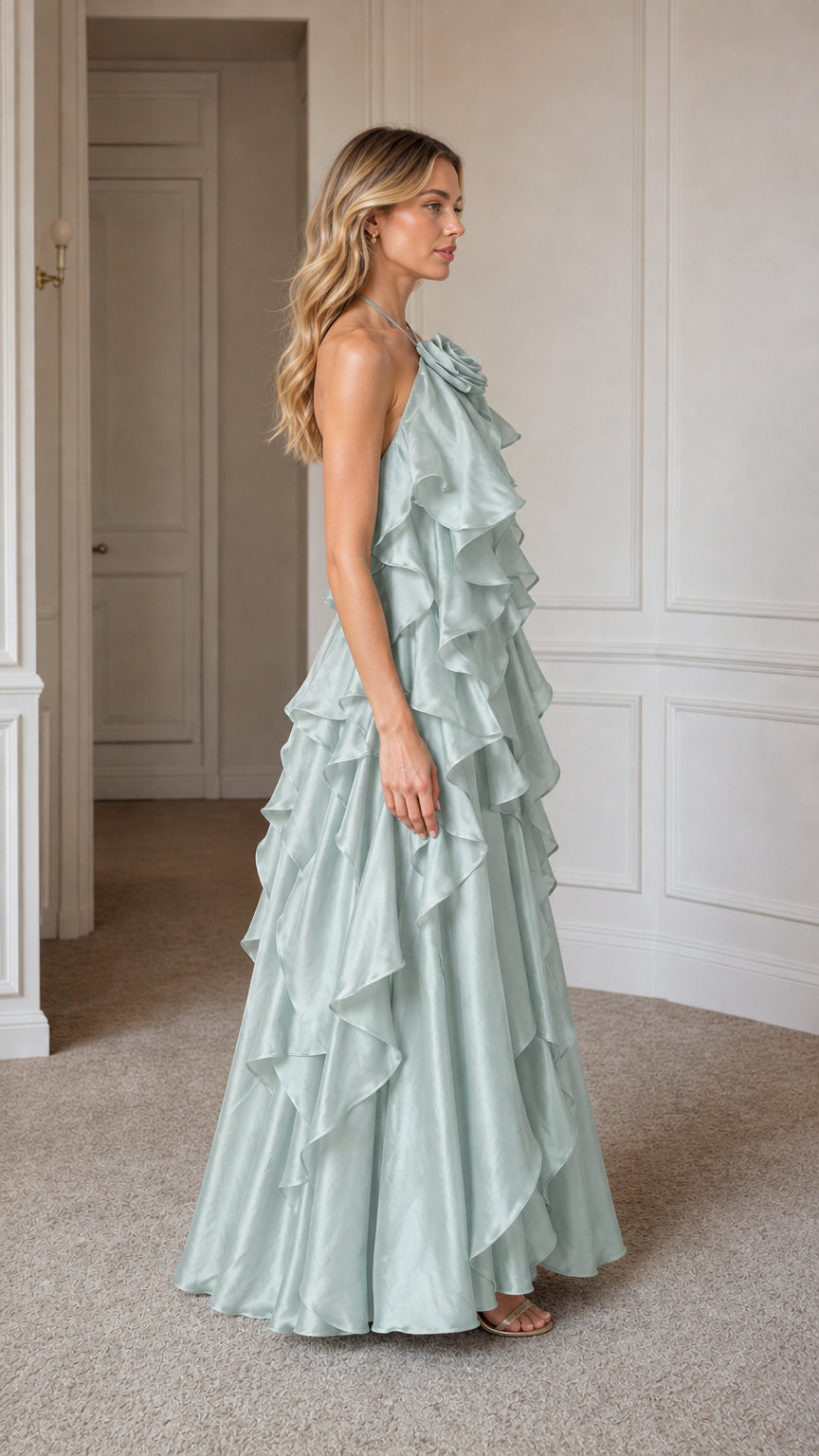 Side profile view of sage green ruffle maxi dress