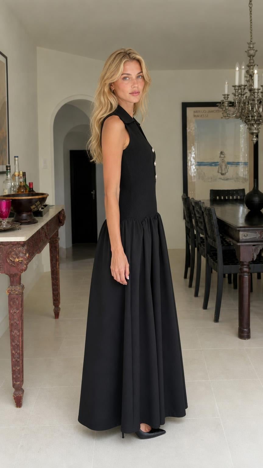 Side profile of woman in black maxi dress