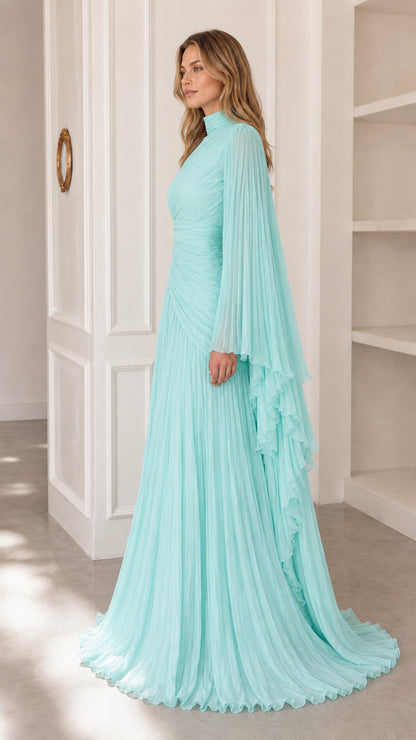 Side profile of model in aqua blue pleated long evening dress