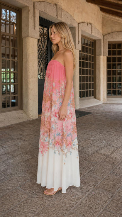 Side view of model in pink floral strapless maxi dress