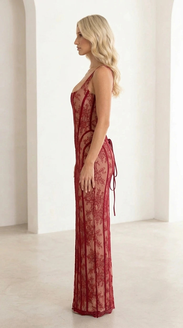 Side profile view of burgundy lace dress