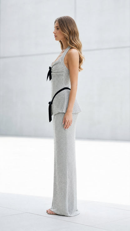 Side profile view of silver glitter evening dress