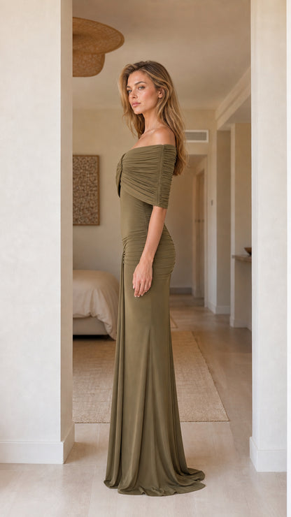 Side profile view of olive evening dress