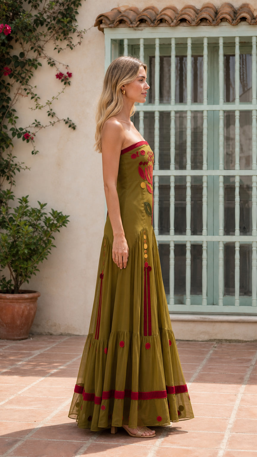Side profile of olive strapless maxi dress
