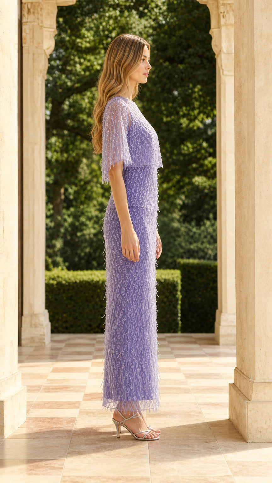 Side view of model in lavender capelet maxi dress