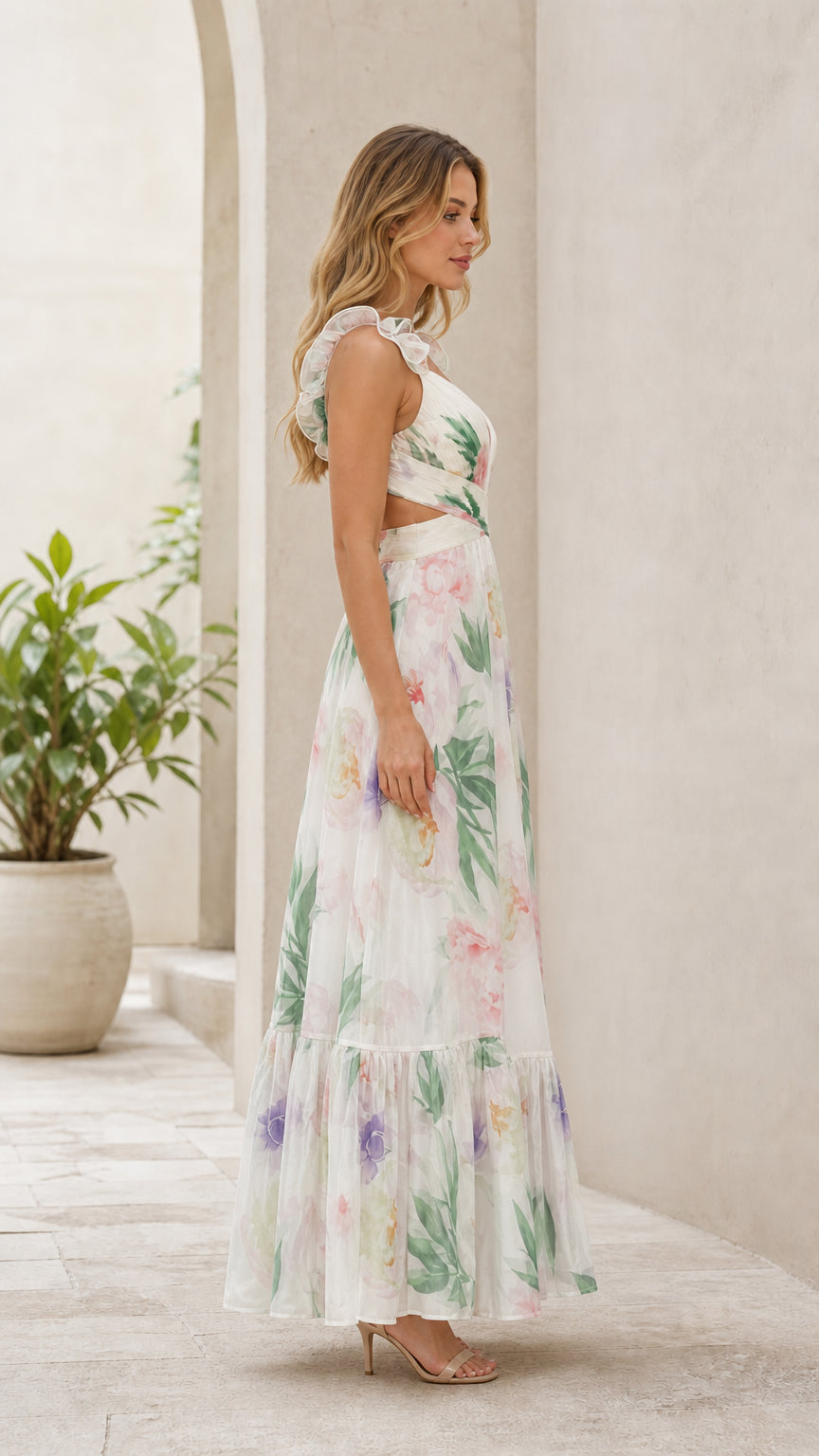 Side profile of white floral maxi dress