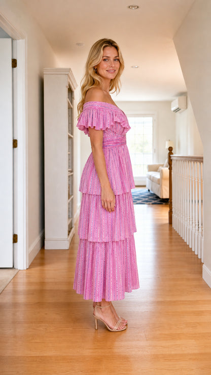 Side view of pink off-shoulder ruffle tiered midi dress