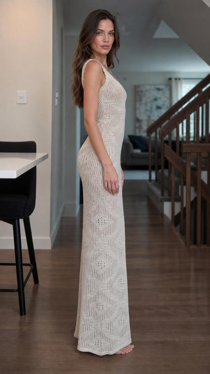 Side profile of woman wearing beige open knit maxi dress