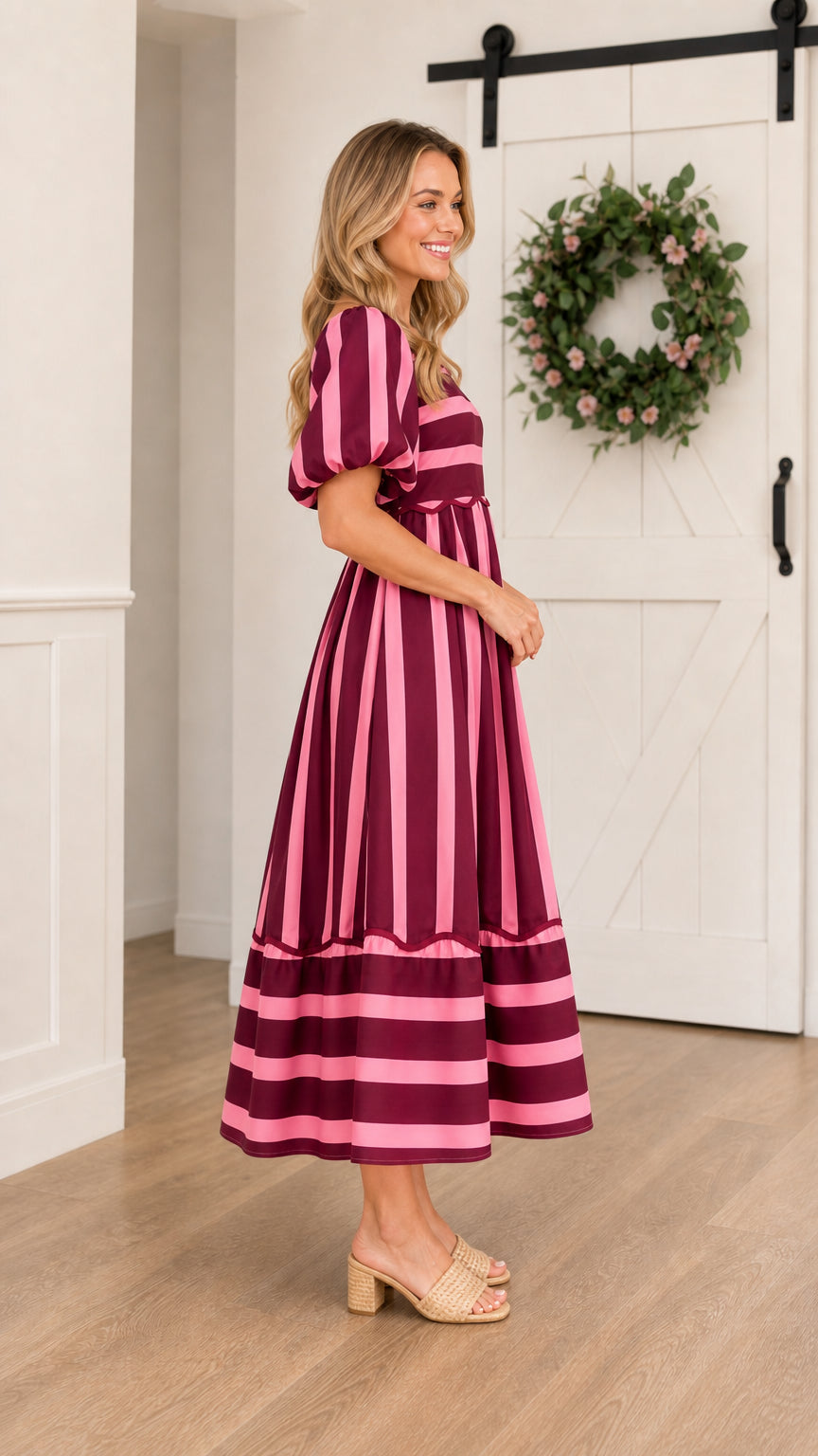 Side view of burgundy striped midi dress