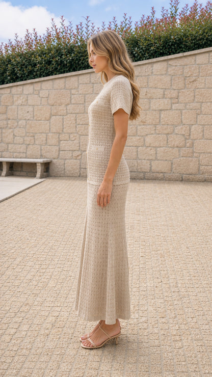 Model wearing beige matching set from the side profile