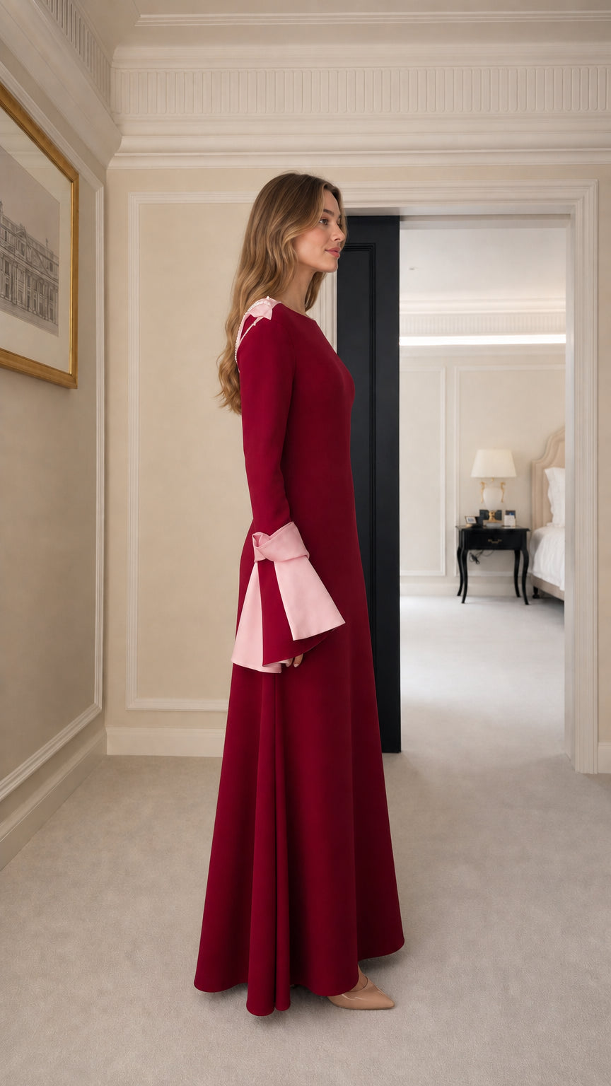Side profile view of Burgundy formal dress
