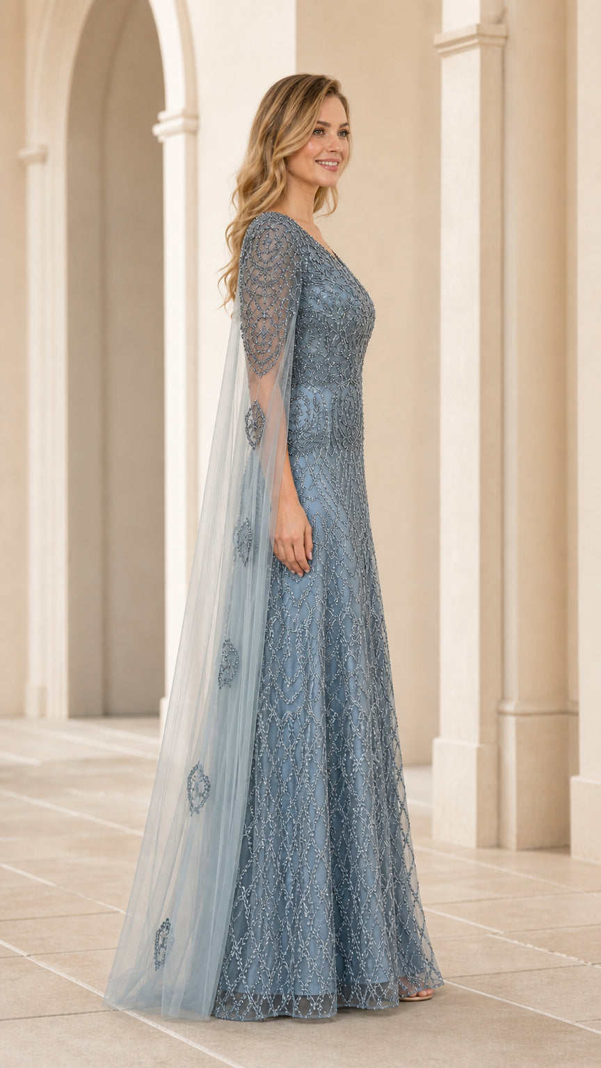 Side angle of dusty blue sequin formal dress showing flowing cape detail