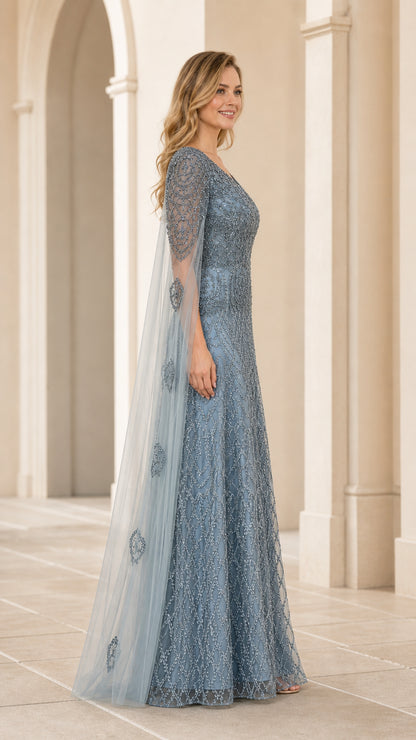 Side angle of dusty blue sequin formal dress showing flowing cape detail