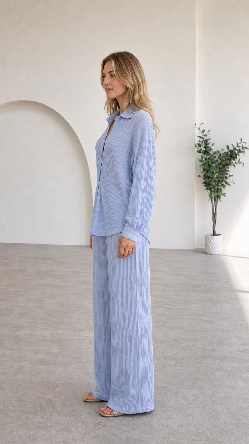 Side profile view of light blue lounge set