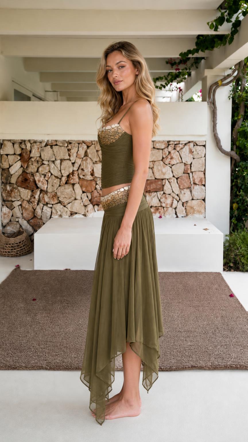 Side profile of model wearing olive green two-piece set