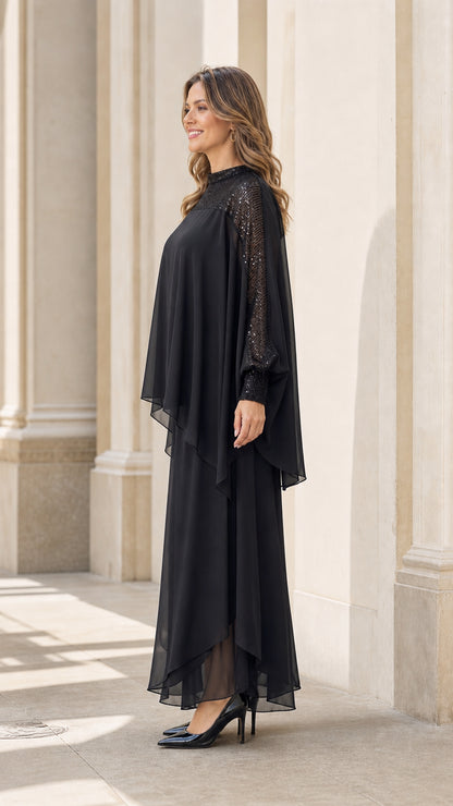 Model wearing black two-piece set, side profile view