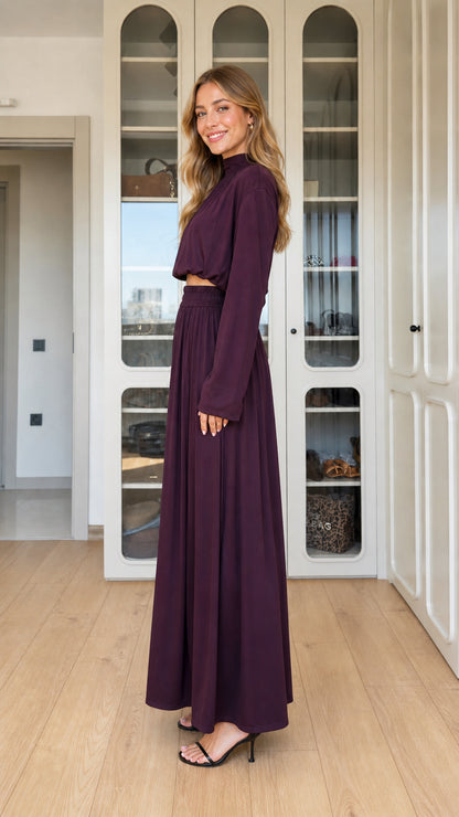 Side full-length view of plum two-piece crop top and palazzo pants outfit