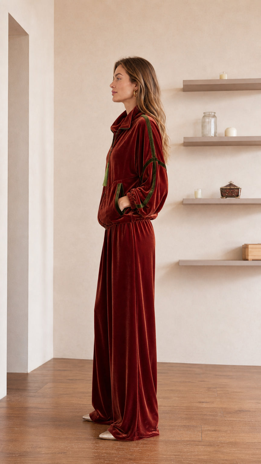 Side profile view of rust velvet loungewear set