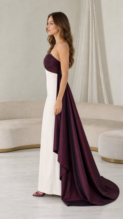 Side profile view of burgundy and white evening gown