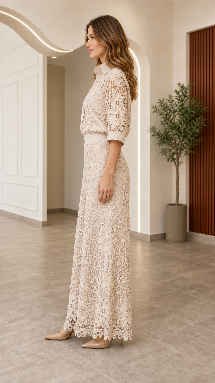 Side profile view of woman wearing beige lace shirt and wide-leg pants set